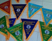 Cờ Lưu Niệm Giao Hữu Bóng Đá – Xưởng May Cờ Hoàng Gia Chuyên May Theo Yêu Cầu
